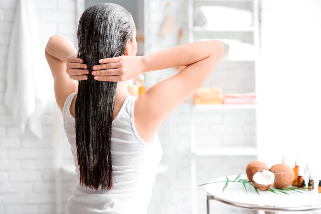 womanconditioning her hair